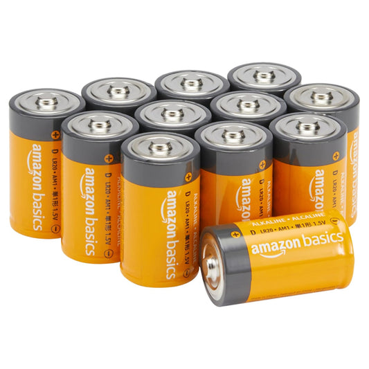 A set of twelve Amazon Basics D Cell 1.5V Alkaline All-Purpose Batteries, with one battery placed in front showing its label, known for reliability and lasting performance.