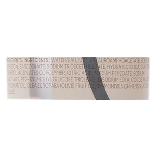 Close-up of a Gillette Venus Intimate Grooming Skin-Smoothing Exfoliant label (2 Pack, 6oz) showing ingredients in small, light text on beige background. This pre-shave exfoliant helps prevent ingrown hairs.