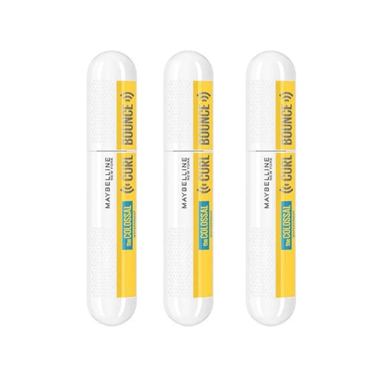 Three Maybelline Volum Express Colossal Curl Bounce Waterproof Curling Mascaras in Brownish Black stand upright, highlighting their volumizing and long-lasting curling power.