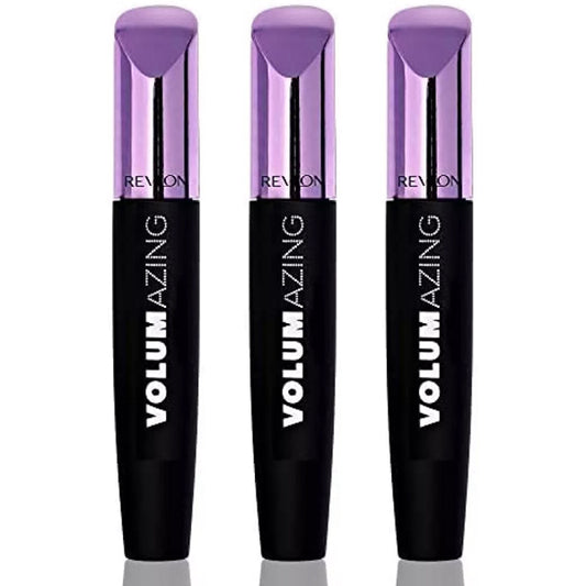 A 3 Pack of Revlon Volumazing Mascara 901 Blackest Black is displayed upright, each tube featuring signature metallic purple caps and black bodies, promising clump-free, fanned-out lashes.