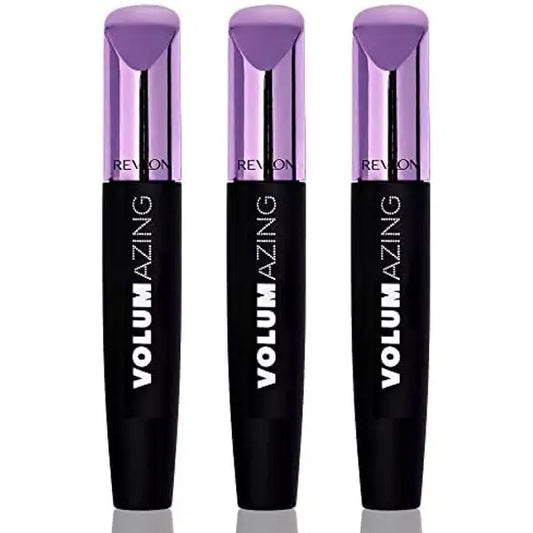 A 3 Pack of Revlon Volumazing Mascara 901 Blackest Black is displayed upright, each tube featuring signature metallic purple caps and black bodies, promising clump-free, fanned-out lashes.