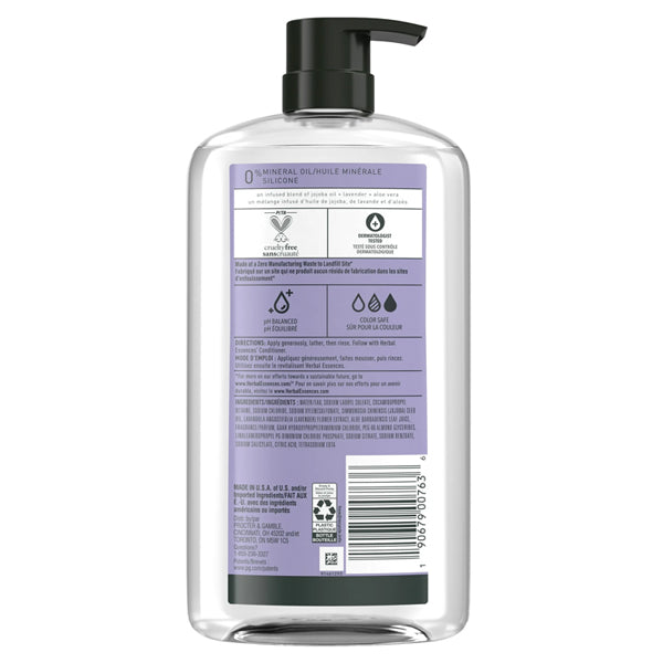 A clear plastic pump bottle of Herbal Essences Jojoba Oil & Lavender Curls Shampoo (29.2oz, 3 Pack) with a purple label showing ingredients, usage info, recycling symbols, and a barcode on the back.