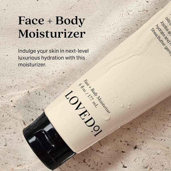 A 3 Pack of Loved 01 Face + Body Moisturizer with Rosehip & Sea Buckthorn (6oz) lies on a beige surface, featuring water drops. This plant-based formula hydrates and nourishes skin for lasting moisture.