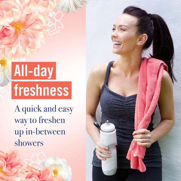 Woman in athletic wear holds a water bottle and pink towel, smiling after a workout. Text reads: Stay fresh anytime with Vagisil Scentsitive Scents Feminine Dry Wash Deodorant Spray 2.6oz—easy freshness for intimate skin between showers. 3 Pack by Vagisil.