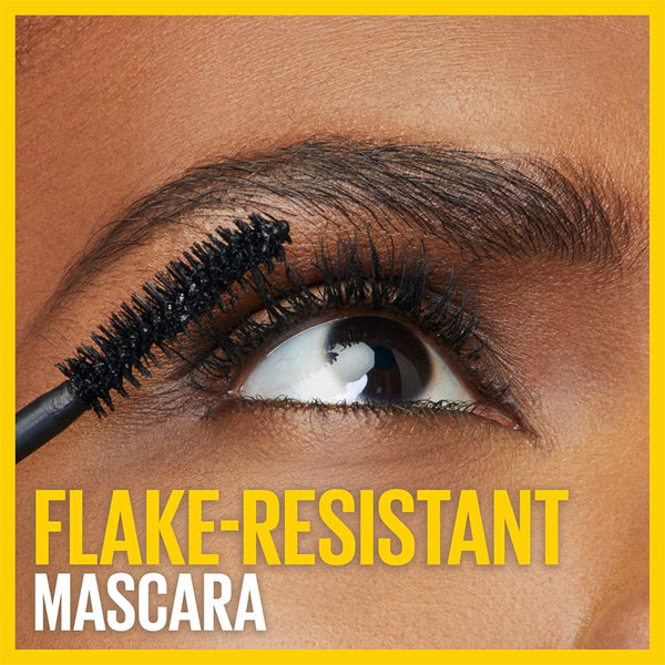 A close-up of someone applying Maybelline Volum Express Colossal Curl Bounce Mascara Blackest Black with the text Flake-Resistant Mascara in bold yellow. Product shown: 3 Pack - Maybelline.