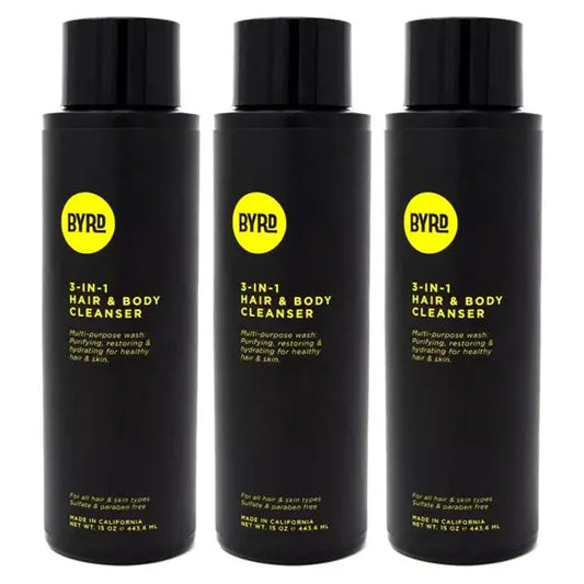 Three black bottles of BYRD 3 Pack 3-in-1 Hair & Body Cleanser Coconut & Sea Salt, each 15oz with yellow branding, stand upright against a white background.