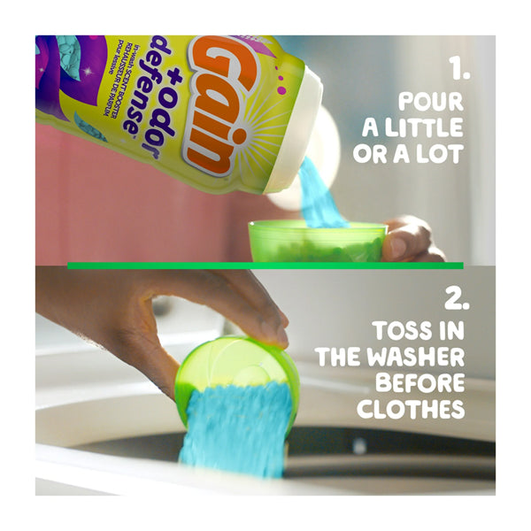 A person pours Gain + Odor Defense In-Wash Scent Booster Super Fresh Blast beads (from the 5 Pack, 5.7 oz) into a cap, tosses them into the washer before adding clothes, with text showing step-by-step instructions for lasting freshness.