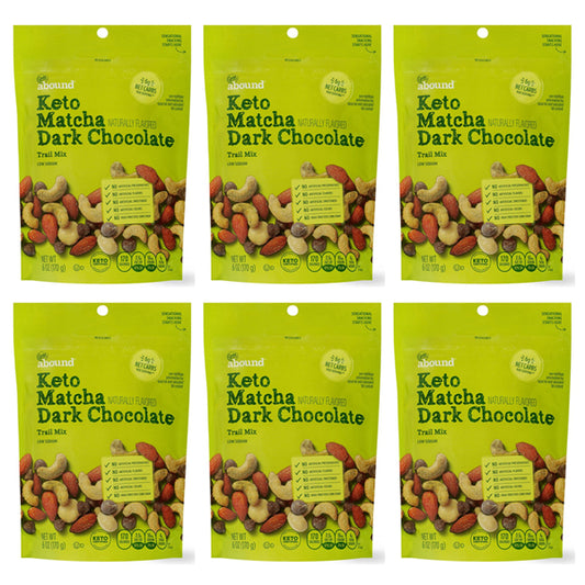 Six packs of Gold Emblem Abound Keto Matcha Dark Chocolate Trail Mix 6oz are displayed in two rows on a plain background.
