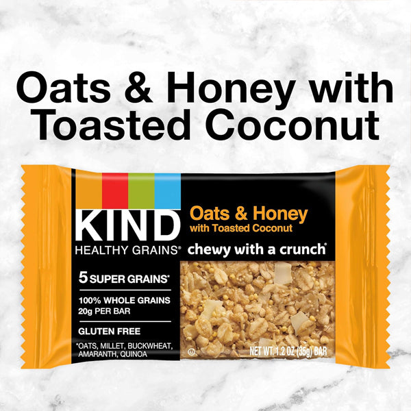 The Kind 8 Pack Healthy Grains Bars Oats & Honey with Toasted Coconut (1.2oz, 5 count each) shows the product name, super grains ingredients, and nutritional highlights on its gluten free wrapper.