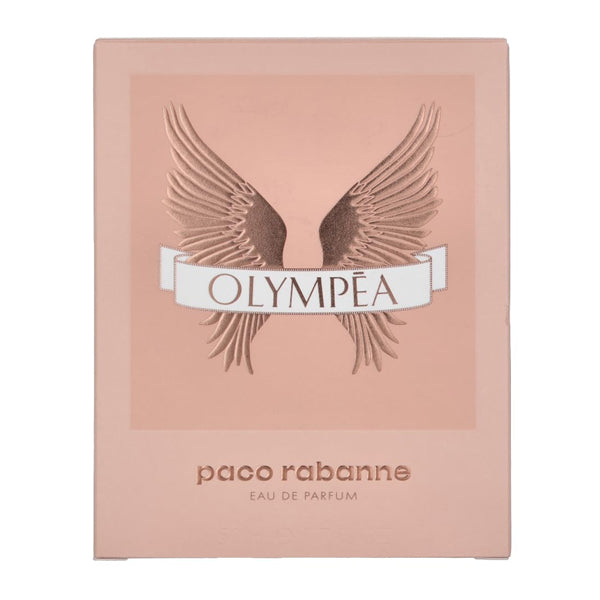 A pink box displays the Paco Rabanne Olympea Eau De Parfum For Women 1.7oz logo with bronze wings and Olympea text, capturing the iconic amber floral scent from Paco Rabanne.