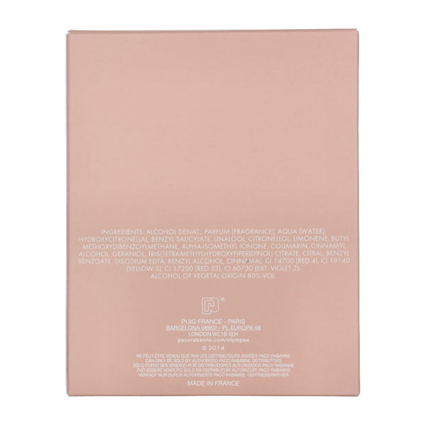 Back of the pink Paco Rabanne Olympea Eau De Parfum for Women 1.7oz box shows ingredients, company, and manufacturing details in white text—echoing the refined packaging style typical of Paco Rabanne fragrances.