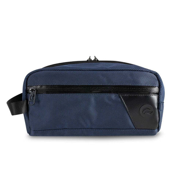 The Skunk DOPE Kit is a navy blue, water-resistant toiletry bag with a black front zipper pocket, black corner accent, activated carbon lining for odor control, and a side handle by Skunk.