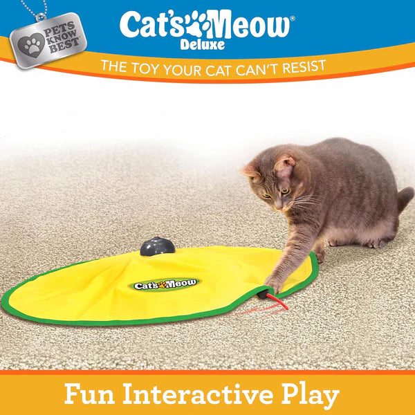 A gray cat plays on the carpet, pawing at a moving object under the fabric of the yellow Pets Know Best Cats Meow Interactive Cat Toy by Pets Know Best.