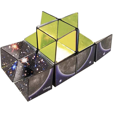 The California Creations The Amazing Star Cube Cosmos Edition is a space-themed puzzle with triangular segments and gold reflective surfaces, twisted into an angular shape.