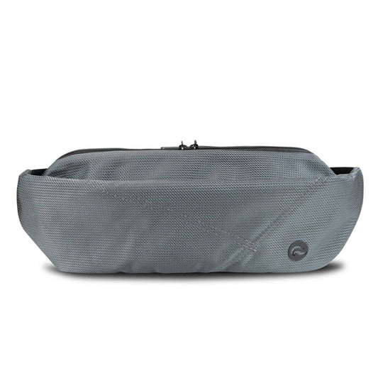 The Skunk Drifter Medium Crossbody Bag in Metal Gray features 100% smell and weather proof carbon lining, a textured surface, zip closure, and a small circular logo in the corner. Shown against a white background.