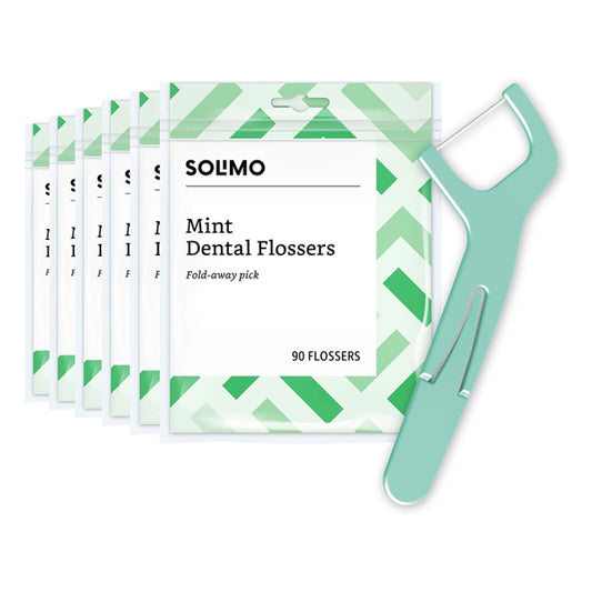Six packs of Solimo Mint Dental Flossers, 90 flossers each (540 count total), are displayed with a single green flosser. From Solimo, these shred-resistant flossers help fight plaque for a cleaner, fresher mouth.