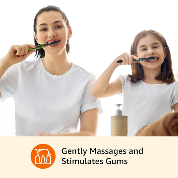 An adult and a child, both in white shirts, brush with Amazon Basics Pulsating Soft Deep Cleaning Toothbrushes (2 Pack), as a caption reads: Gently Massages and Stimulates Gums.