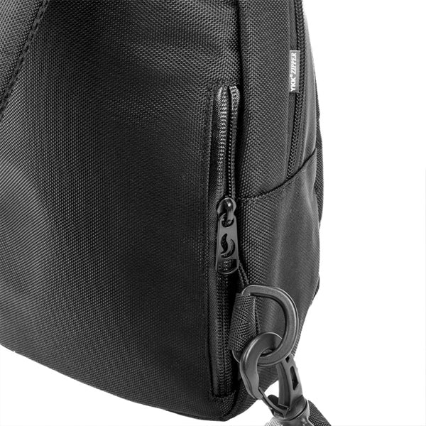 Close-up of the Skunk Uno Crossbody Sling Bag by Skunk, a black sling bag with zip pocket, zipper pull, and strap hook, featuring 100% smell and weather proof carbon lining for discreet odorless carry.