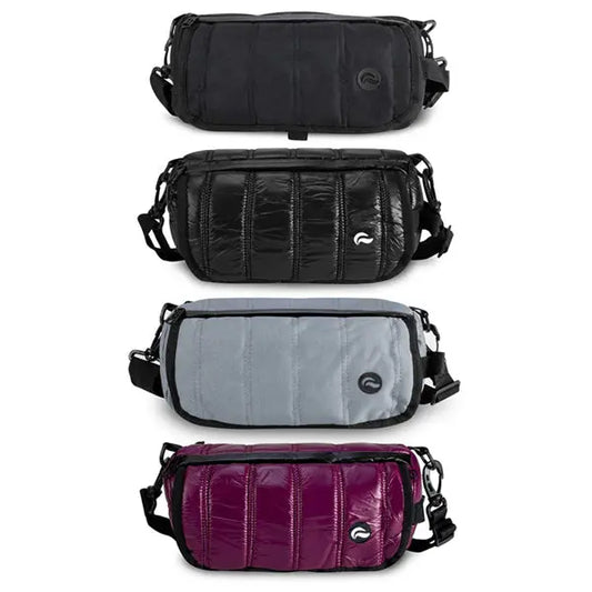 Four Skunk Uptown Crossbody Duffle Bags—black, shiny black, gray, and shiny purple—each 100% smell & weather proof with carbon lining, front pocket, zipper, and adjustable strap, displayed vertically on a white background.