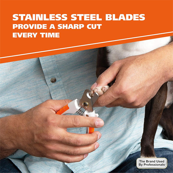 A person trims a dog’s nails with the WAHL Stainless Steel Pet Nail Clipper Model 858448, featuring an ergonomic rubber grip and sharp stainless steel blades by Wahl.