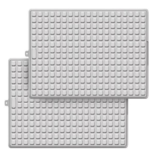 The Deal Society Self Draining Silicone Dish Drying Mat 16 x 12 Twin Pack features two gray rectangular mats with raised square patterns and side tabs, designed for quick drying and heat resistance, shown slightly overlapping.