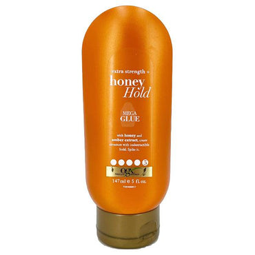 OGX Extra Strength Honey Hold Mega Glue, with honey and amber extract, provides indestructible hold in a 5 oz (147 ml) orange bottle. Available in 3 or 6 packs.