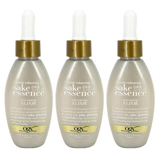 Three bottles of OGX Youth Enhancing + Sake Essence Rejuvenating Elixir with Droppers (3.8 fl oz each) are shown side by side against a white background—perfect for promoting youthful hair.
