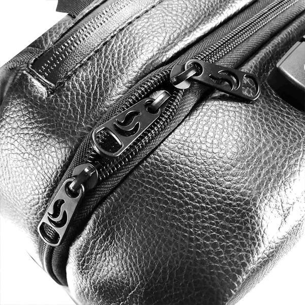 Close-up of the Skunk Elite Backpack: a black, textured leather bag with three flame-pull zippers, 100% odor proof thanks to activated carbon lining, weather proof storage, and a secure combo lock by Skunk.