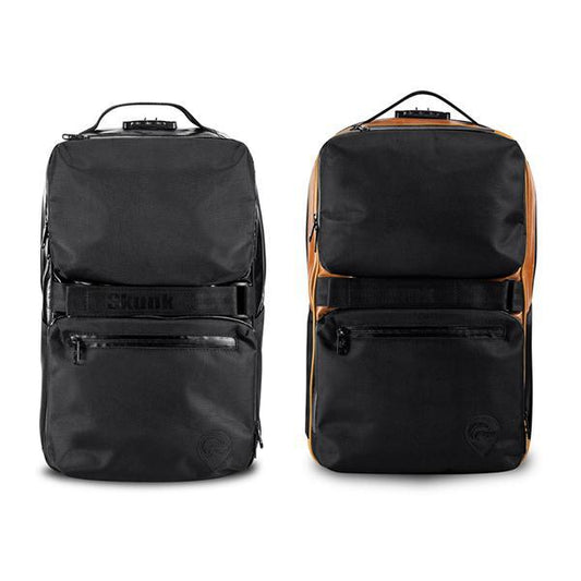 Two Skunk SoHo Smell Proof Backpacks are shown: one all black, the other black with orange sides. Both have front zippered pockets, top handles, a combo lock, and activated carbon lining for 100% odor-proof protection.