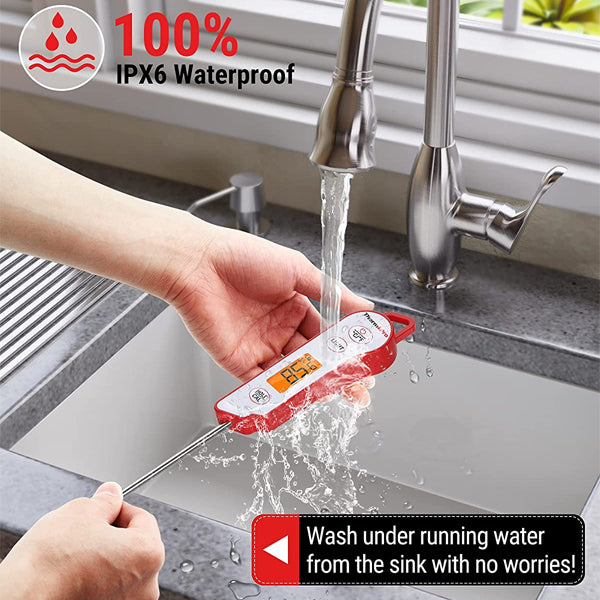 A person rinses the ThermoPro TP15 Waterproof Instant Read Food Thermometer under running water in a kitchen sink, demonstrating its waterproof design.