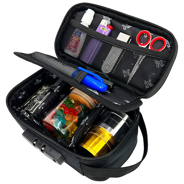 The Erozul Genesis v2 Medium Smell Proof Case by Erozul features mesh pockets holding a lighter, scissors, eyedrop bottle, pen, containers like a jar of gummy bears and metallic grinder—all in a water-resistant, lockable design.