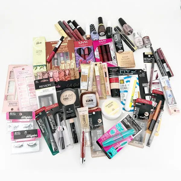 Deal Society Wholesale Mixed Makeup & Beauty Tools—Lot of 50 pieces featuring lipsticks, mascaras, eyeshadows, foundations, nail polishes, and essential beauty tools arranged on a white surface.