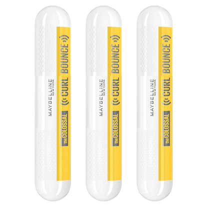 Three Maybelline Volum Express Colossal Curl Bounce Mascara Blackest Black tubes are displayed upright, showcasing this volumizing, long-wearing mascara by Maybelline with a curling effect.
