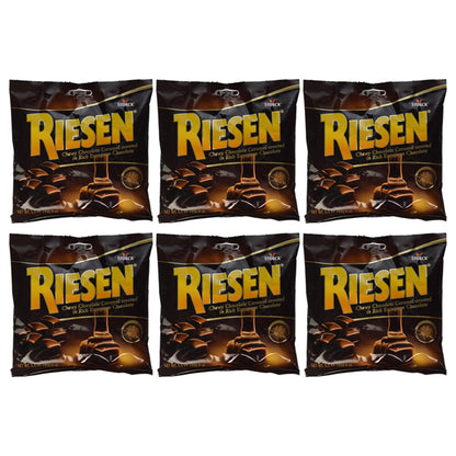 Six packs of Riesen Chewy Chocolate Caramel Covered in Chocolate (5.5oz each) are neatly arranged in two rows of three against a white background.
