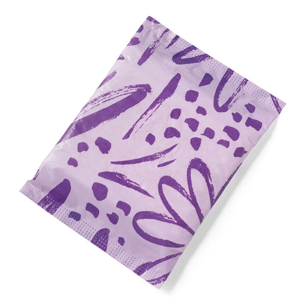 The CVS Health Sure Thing Ultra-thin Pads for Teens with wings Regular 16ct (6 Pack) come in a discreet purple poly mailer with abstract brushstroke and dot patterns, designed to protect these super-absorbent pads.