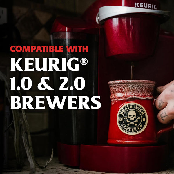 A Death Wish mug is filled with bold, premium coffee brewed from Death Wish Coffee Dark Roast Single-Serve Pods (6 Pack, 10 Count Each) using a red Keurig. Text: Compatible with Keurig 1.0 & 2.0 brewers.