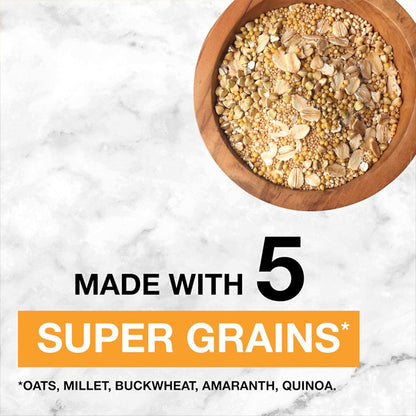 A KIND Healthy Grains Bar rests on marble, packed with 5 super grains—oats, millet, buckwheat, amaranth, quinoa. Enjoy gluten-free whole grain goodness in every 8 Pack of KIND Oats & Honey with Toasted Coconut Bars.