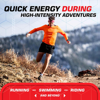 A man in an orange shirt and black shorts runs on a mountain trail. Try Clif BLOKS Energy Chews Margarita Flavor with 3X Sodium—quick energy for high-intensity activities like running, swimming, and riding. Box includes 18 packs (2.12oz each).