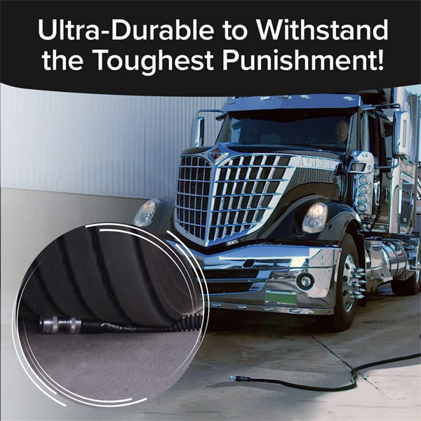 A large semi-truck drives over the Pocket Hose Silver Bullet 50 ft by Pocket Hose on pavement, demonstrating the garden hoses impressive durability and toughness.